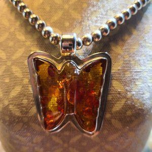 Beautiful Silver/Amber Butterfly pendant on beaded  neckless.